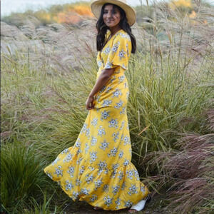 Love kuza satin like golden yellow floral wrap dress. Size M